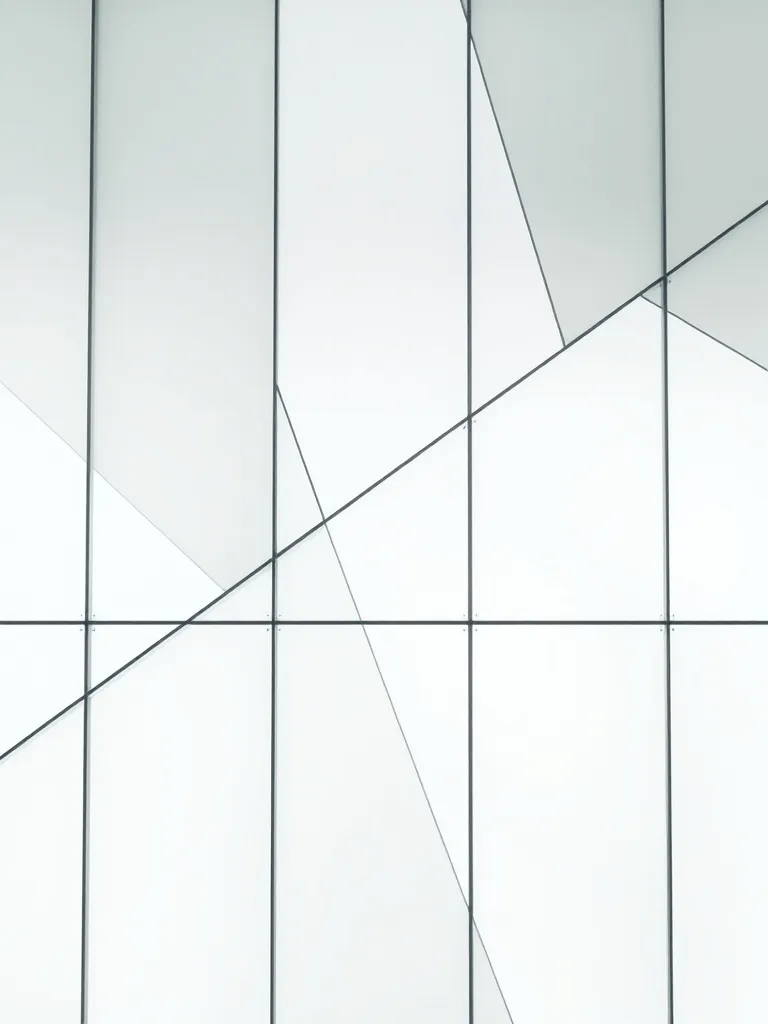 Abstract geometric shapes made of frosted glass and metal, c